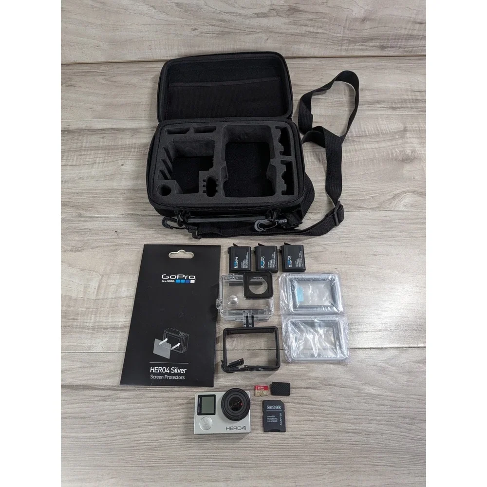 GoPro Hero 4 Silver Edition- with Accessories and Case Included